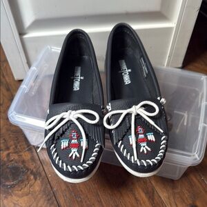 Minnetonka Black and White Moccasins with Classic Design